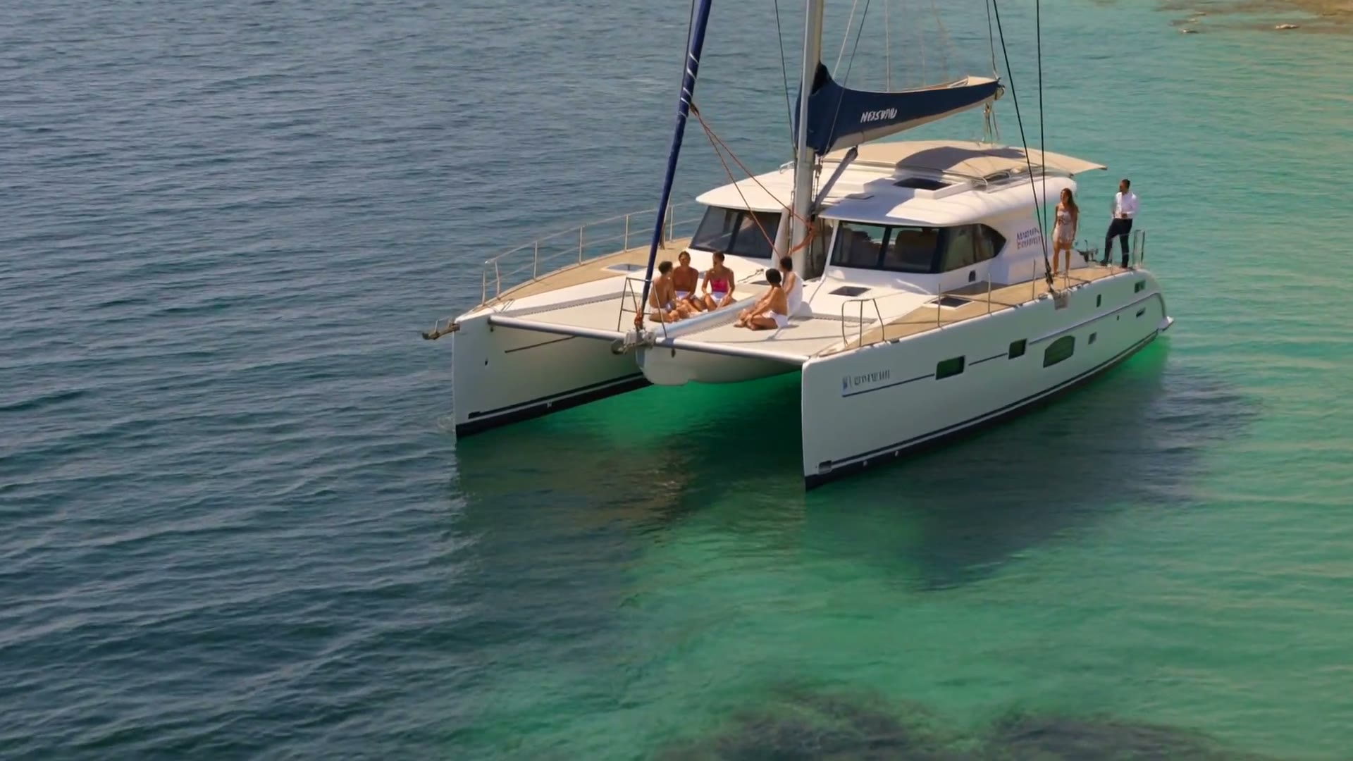 Guests enjoying a charter catamaran